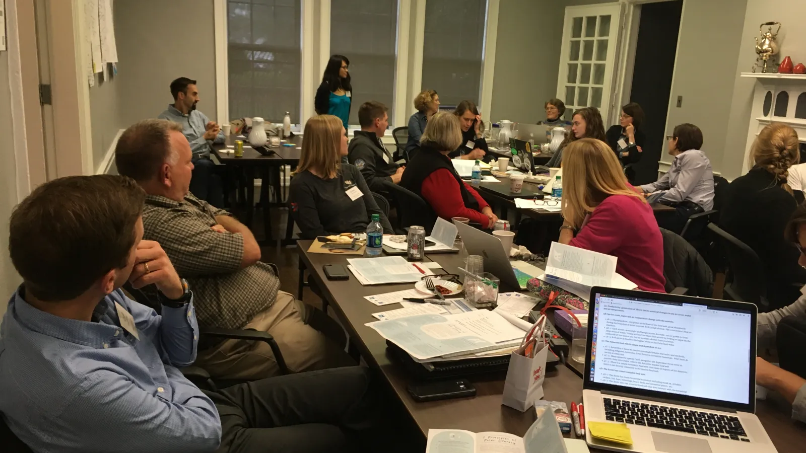 People having a discussion at a round table