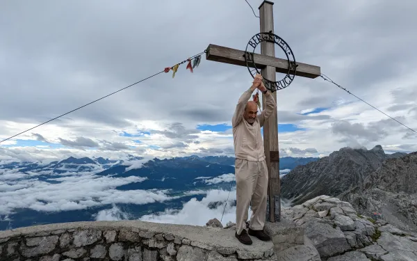 90-year-old Henry Brecher at the Nordkette peak in Innsbruck at 2300 meters above sea level. Image credit to Emily Mazan.